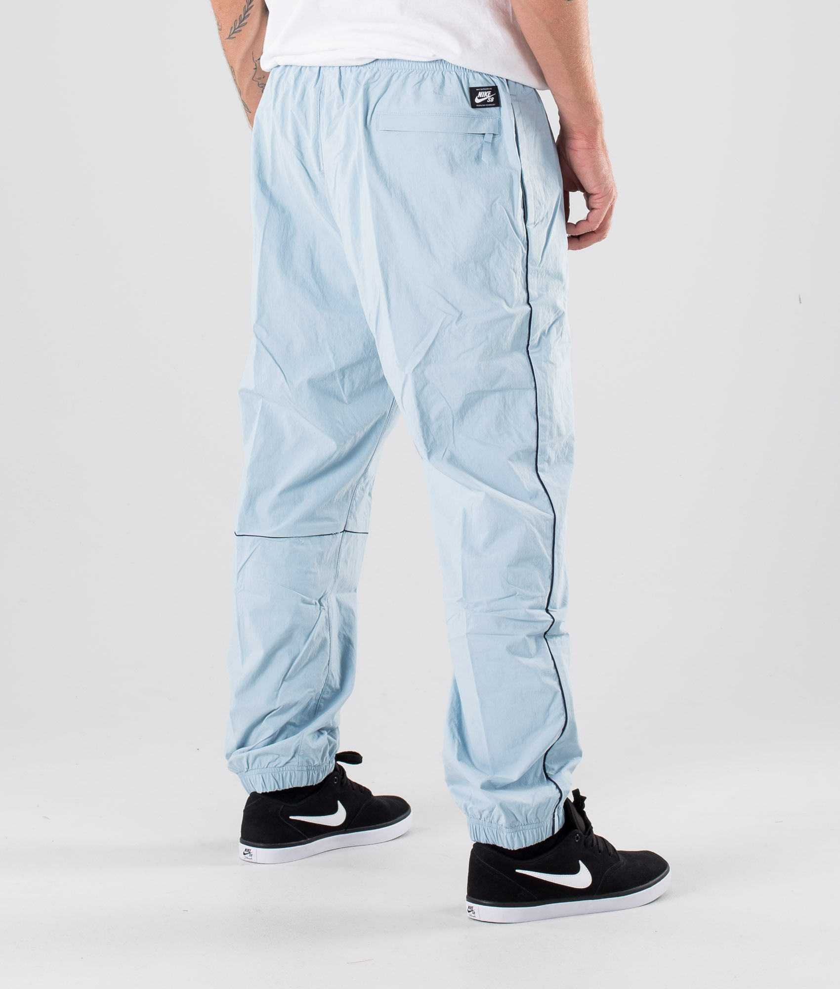 nike sb track pants blue