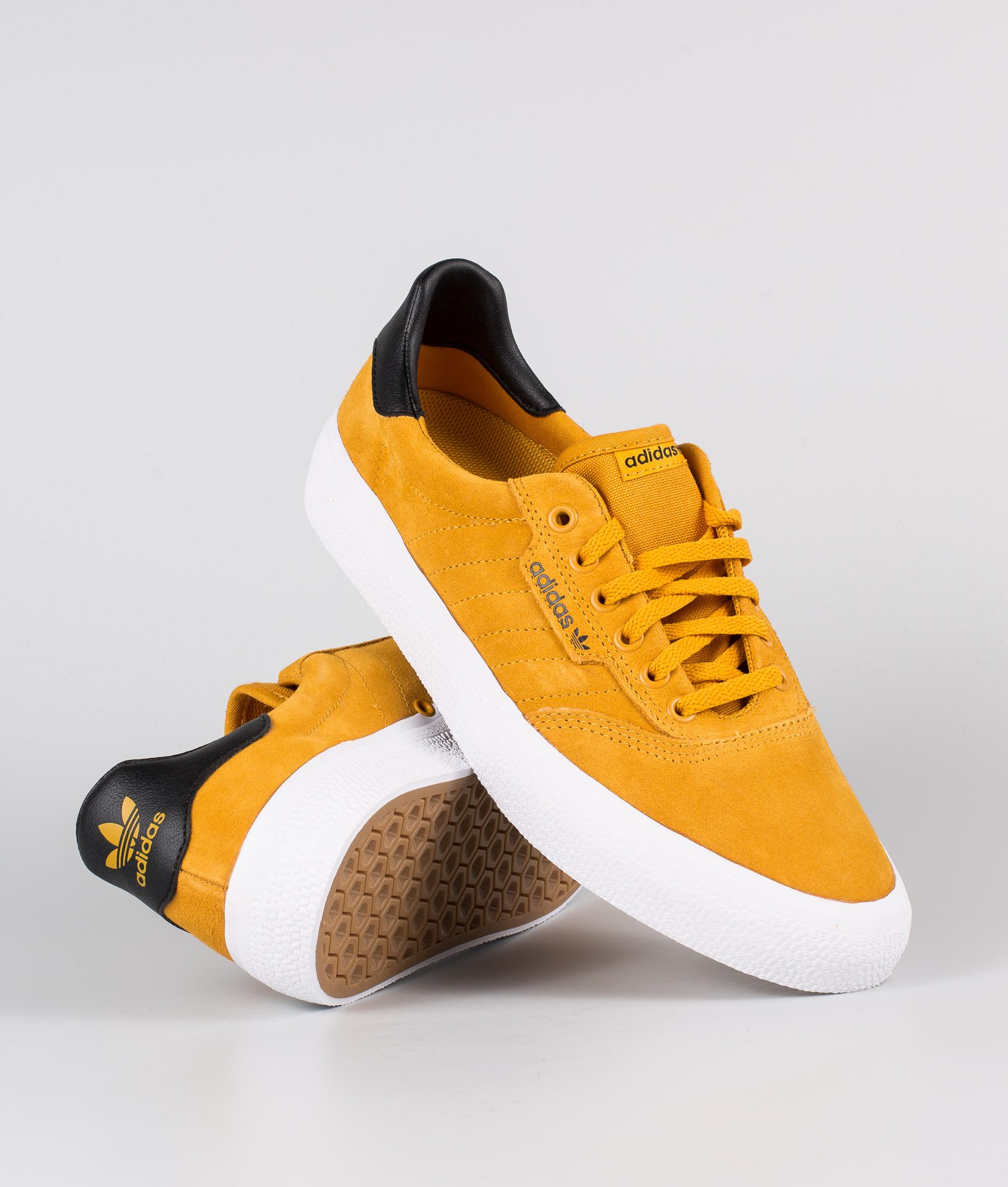 yellow adidas skate shoes
