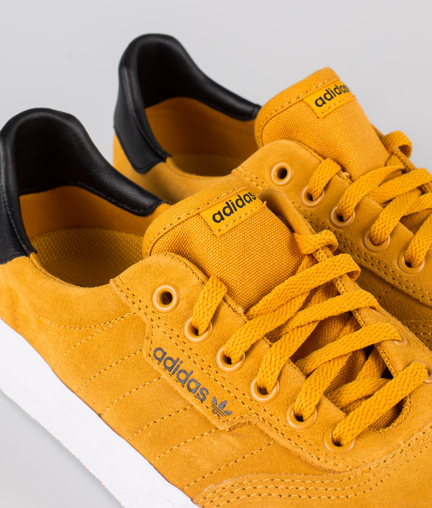 yellow adidas skate shoes 