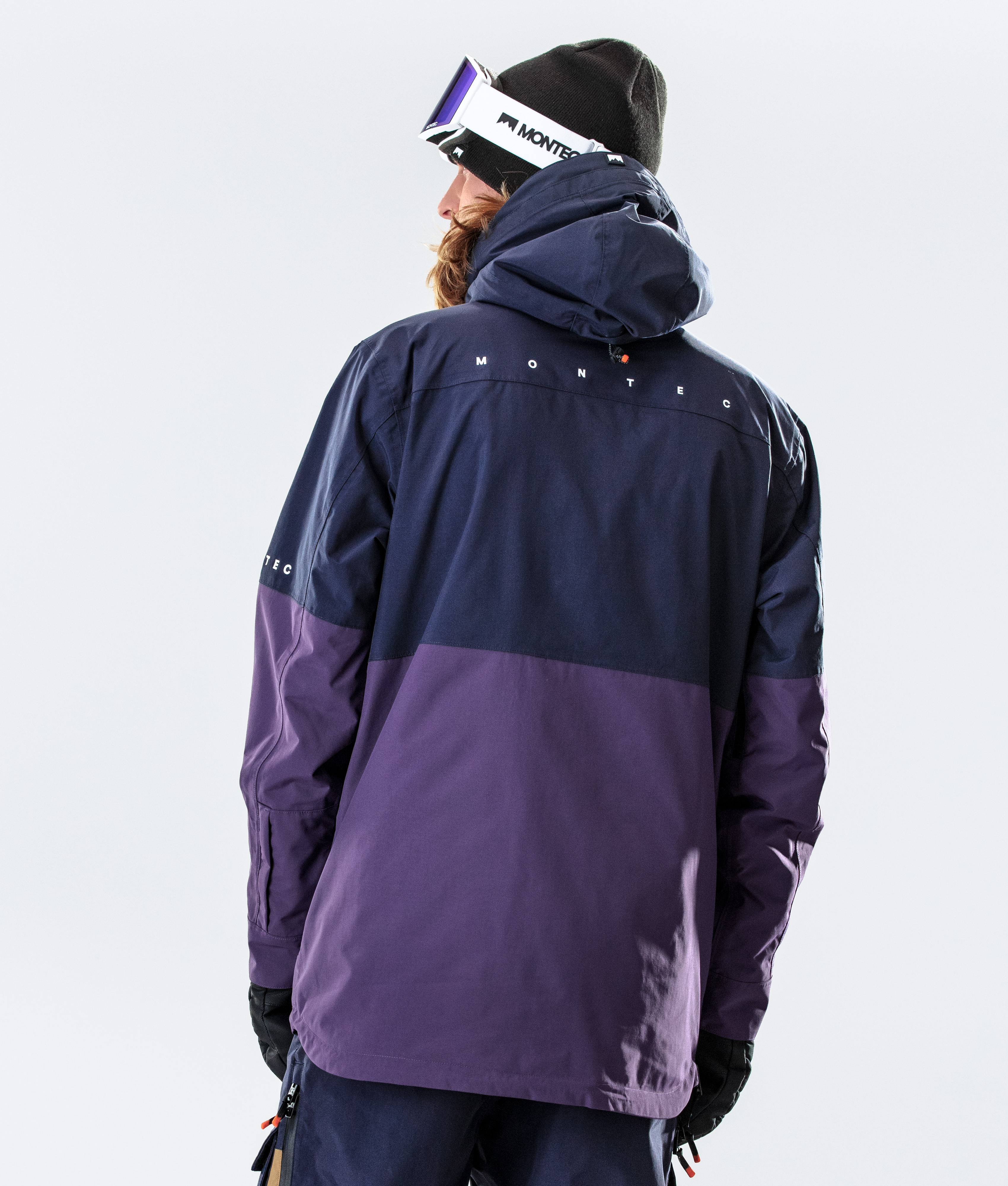 purple ski suit