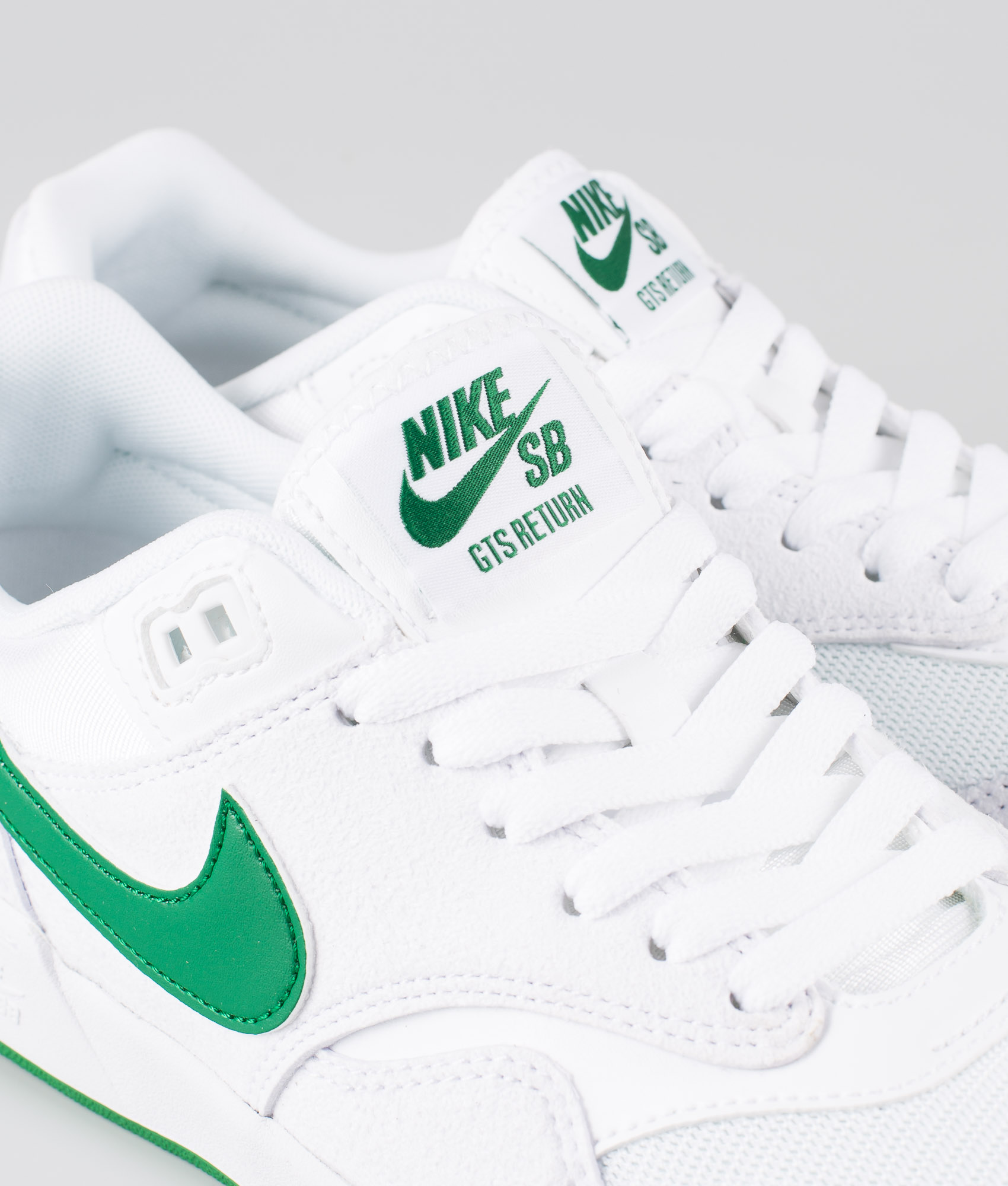nike green and white sneakers