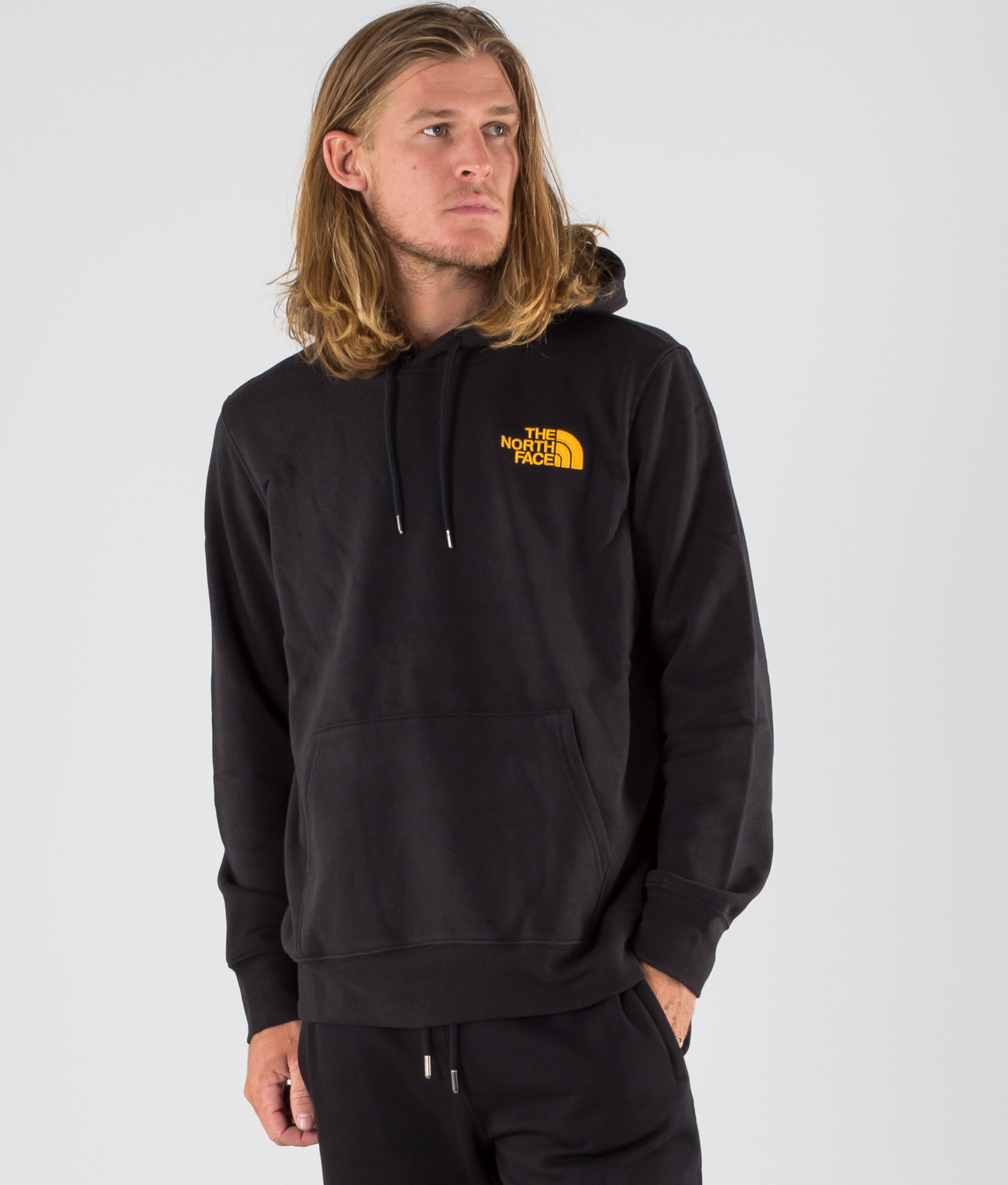 black and gold north face hoodie