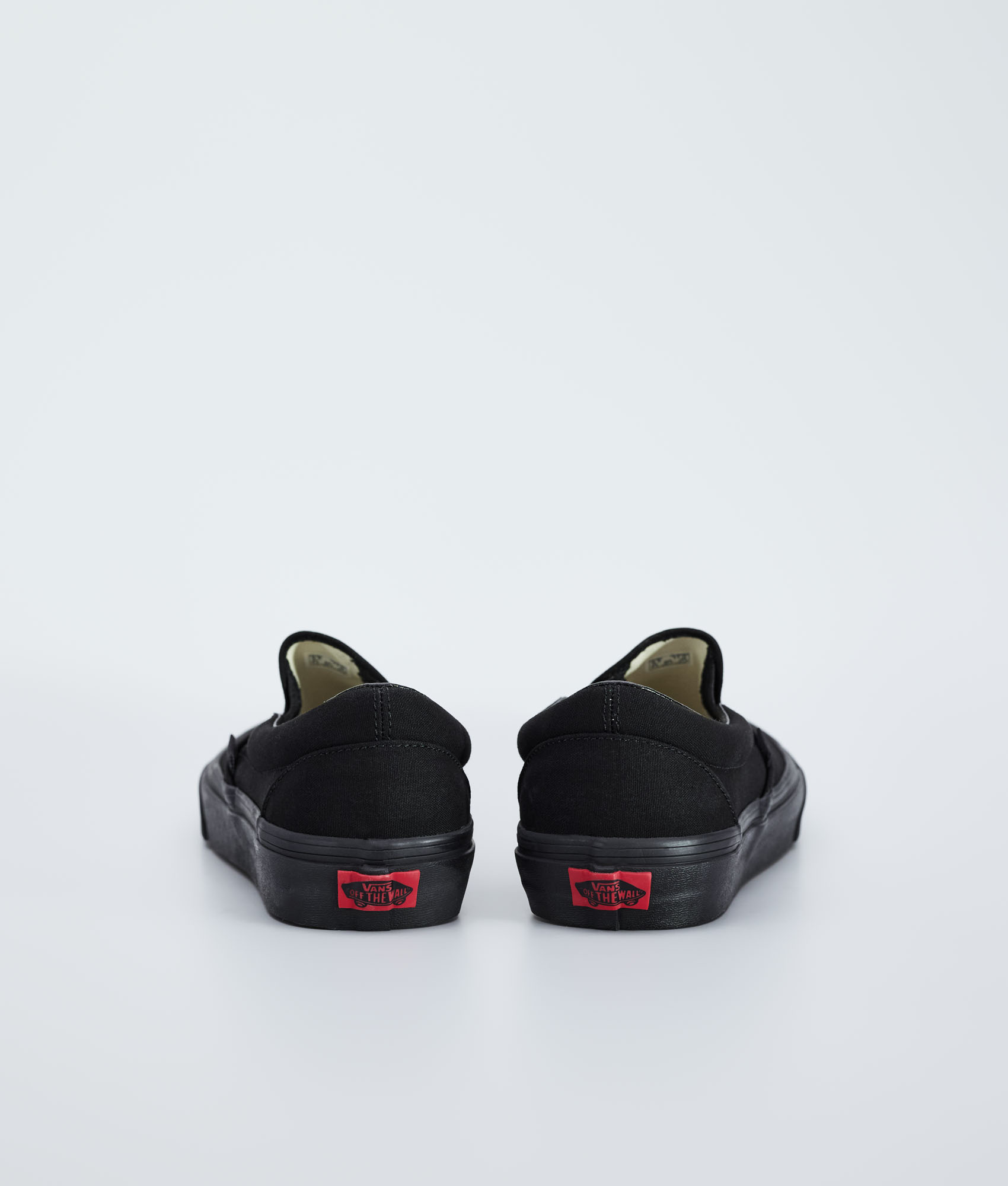 vans triple black slip on