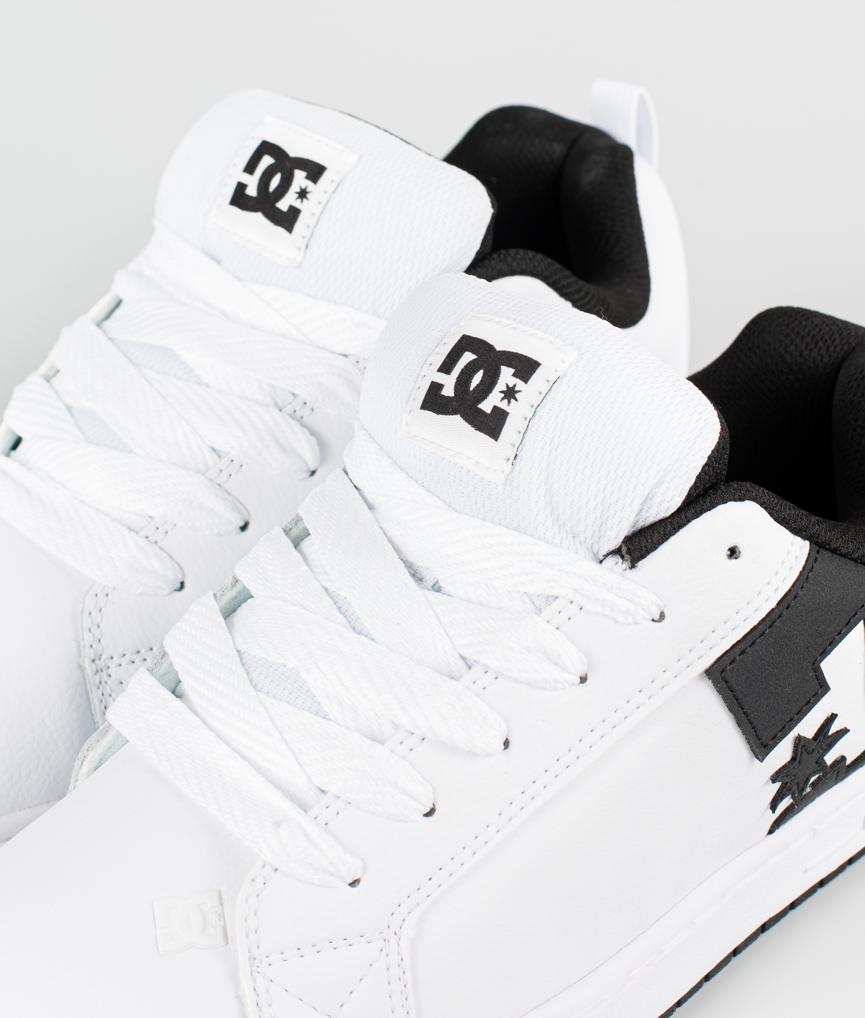 dc court graffik all black skate shoes